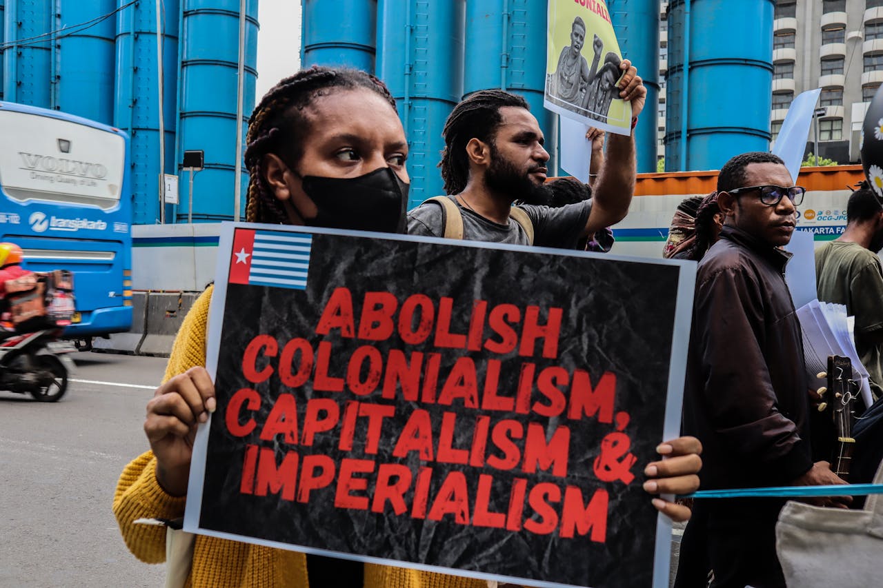 Activists in Jakarta protest against colonialism, capitalism, and imperialism.